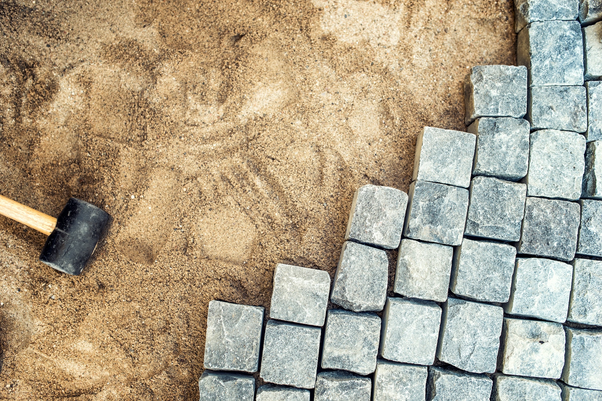 Construction tools and details, pavement installing and rocks